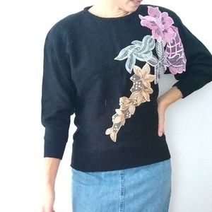 VINTAGE black knit sweater with floral accents